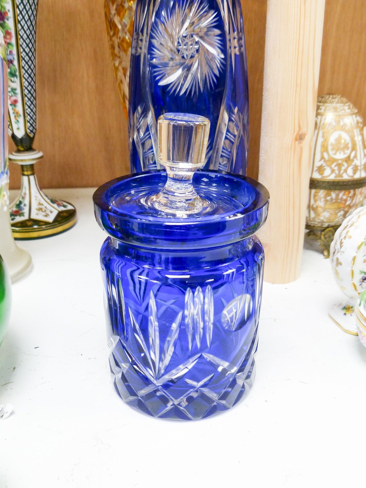 A group of Victorian style fancy glass vases and jugs and other coloured cut glass etc., tallest 29 cm